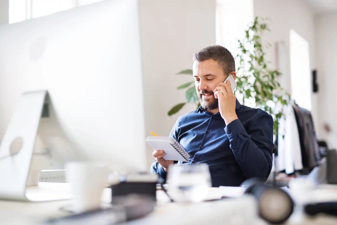 Garage Door Technician listening to their customer needs in Orange County